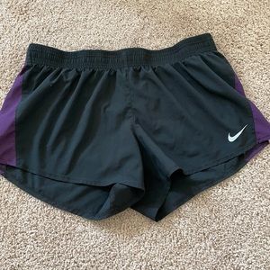 Black Nike running shorts